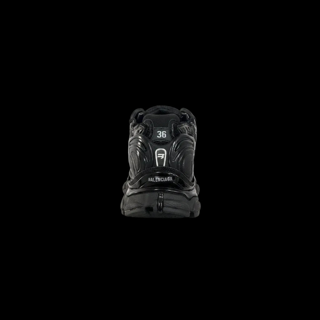 Balenciaga Runner Footwear in black, featuring a bold, modern design ideal for luxury sneaker enthusiasts.