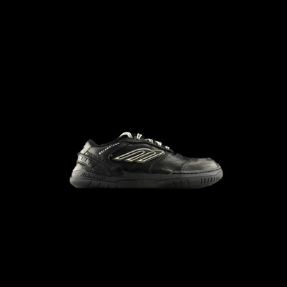 Hamptons Everyday Sneakers in black leather, showcasing luxury craftsmanship and modern casual design.