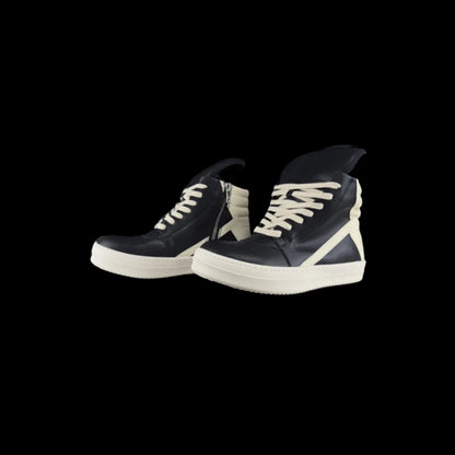 Oversized High-Top Sneakers in black and white with bold high-top silhouette and signature oversized detailing.
