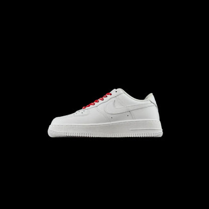 Supreme AF1 Streetwear Sneakers in white with red laces, showcasing a classic basketball silhouette.