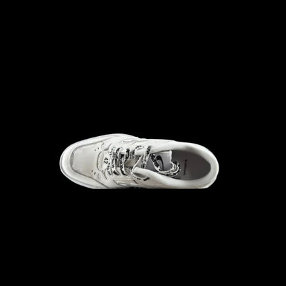 Balenciaga Hamptons Sneakers side view showcasing a contemporary design in white, ideal for streetwear styling.