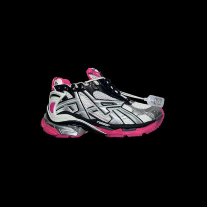 Bold Layered Running Sneakers showcased in a stylish angle with silver and pink detailing on a black background.