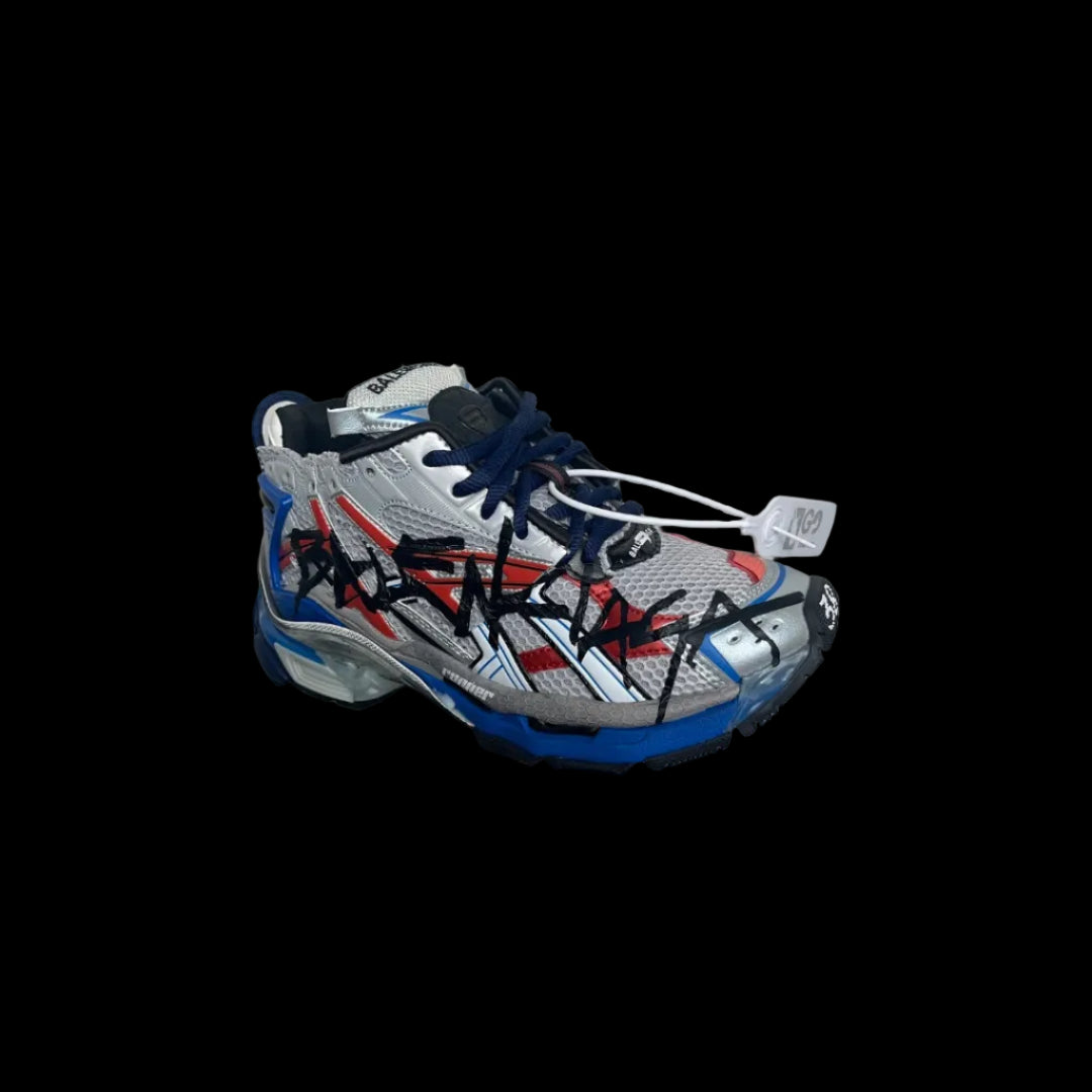Balenciaga Runner Sneakers featuring a bold design with red and blue accents on a silver base.