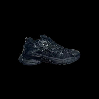 Balenciaga Runner Footwear in black, featuring a bold, modern design ideal for luxury sneaker enthusiasts.