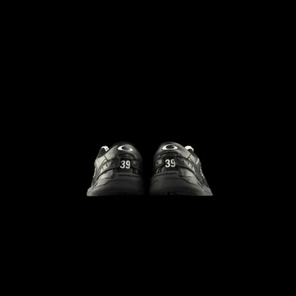 Hamptons Everyday Sneakers in black leather, showcasing luxury craftsmanship and modern casual design.