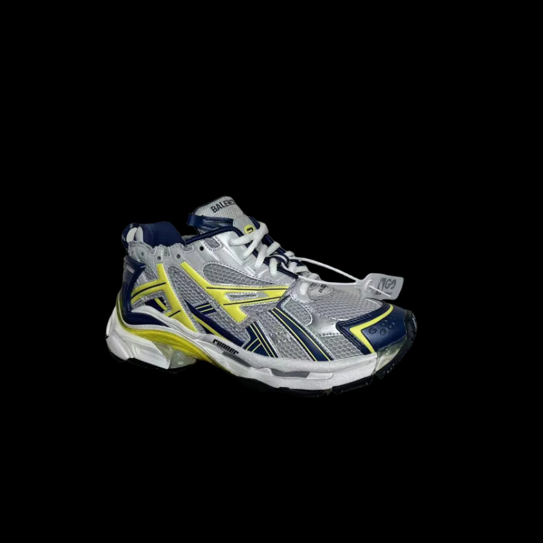 Distressed Running Sneakers in gray fabric with navy and yellow accents showcasing a bold contemporary style.