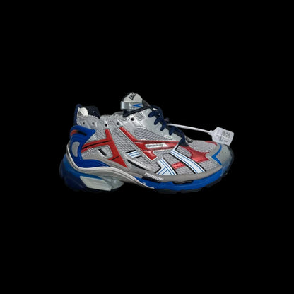 Layered Balenciaga Runners in silver, red, and blue with premium design and bold aesthetic.